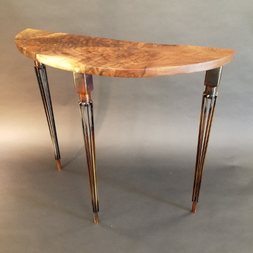 Black walnut burl and oil-flamed welded steel elipse table 